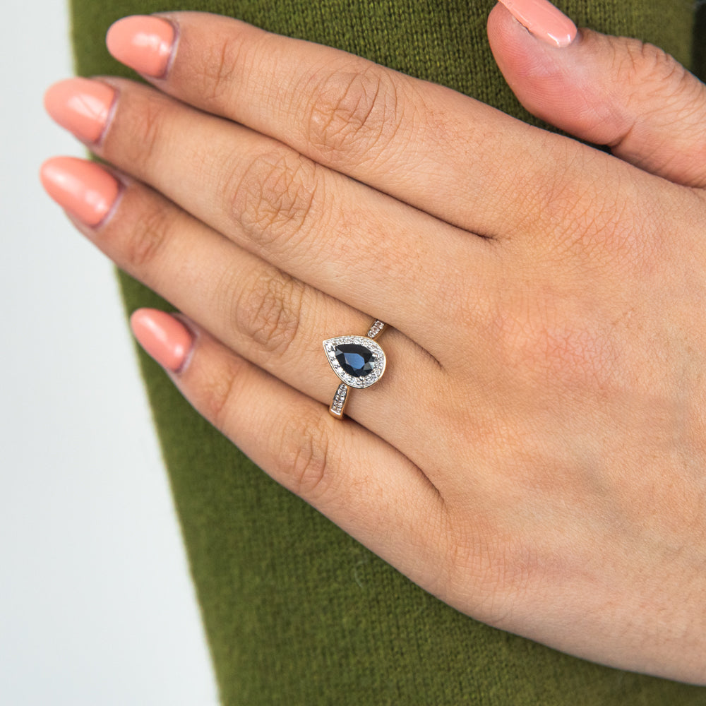 9ct Yellow Gold Ring with 1ct Natural Sapphire and 1/5 Carat Diamond Pear Halo