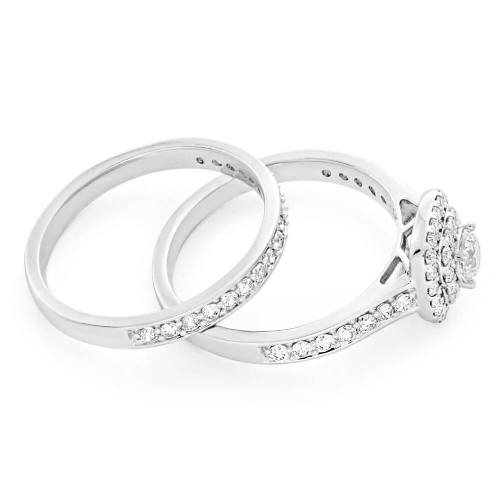 Exquisite 9 Carat White Gold Two - Ring Bridal Jewelry Set Adorned with 65 Sparkling Diamonds Totaling 1 Carat