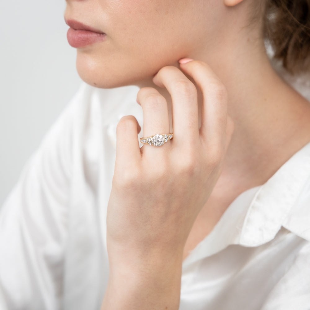 Stunning 14 Carat Yellow Gold Solitaire Ring with a 1 Carat Brilliant Cut Diamond Halo