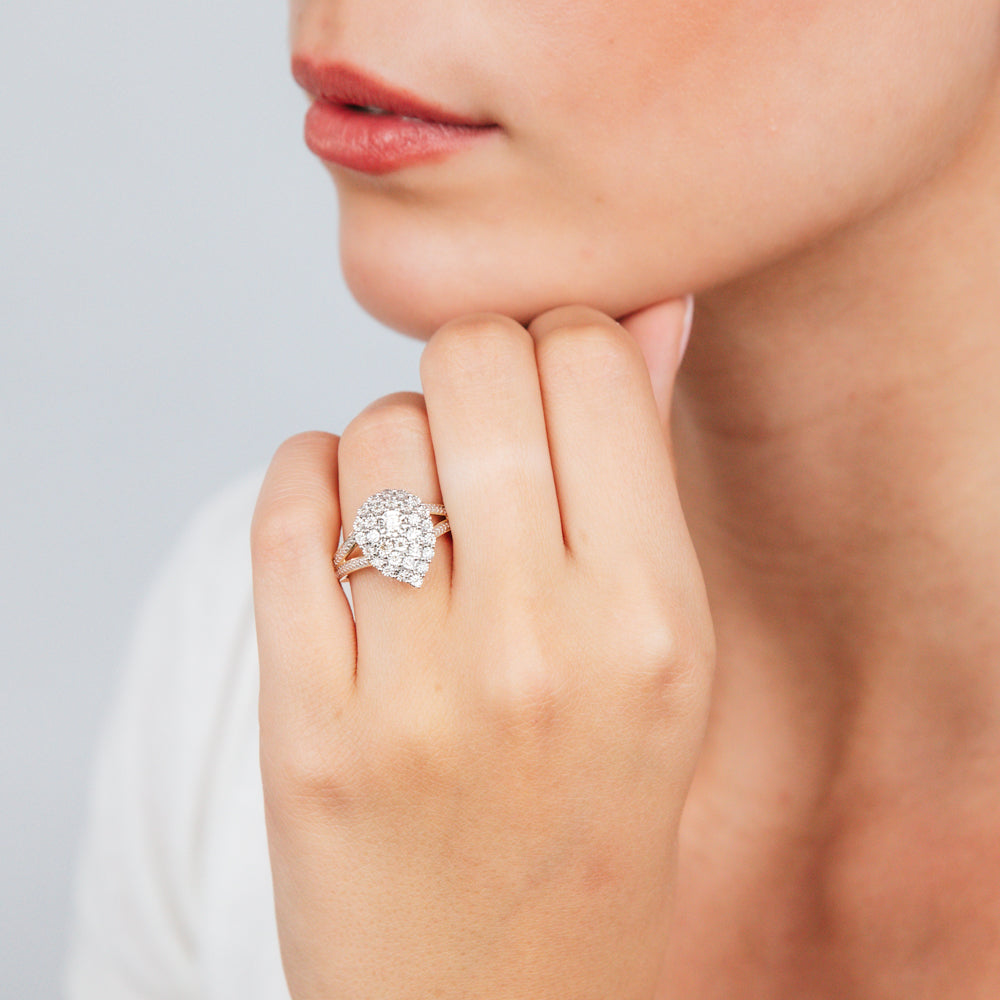 Stunning 9ct Yellow Gold Ring Featuring a Pear Shaped Design with 1/5 Carat of Natural Diamonds