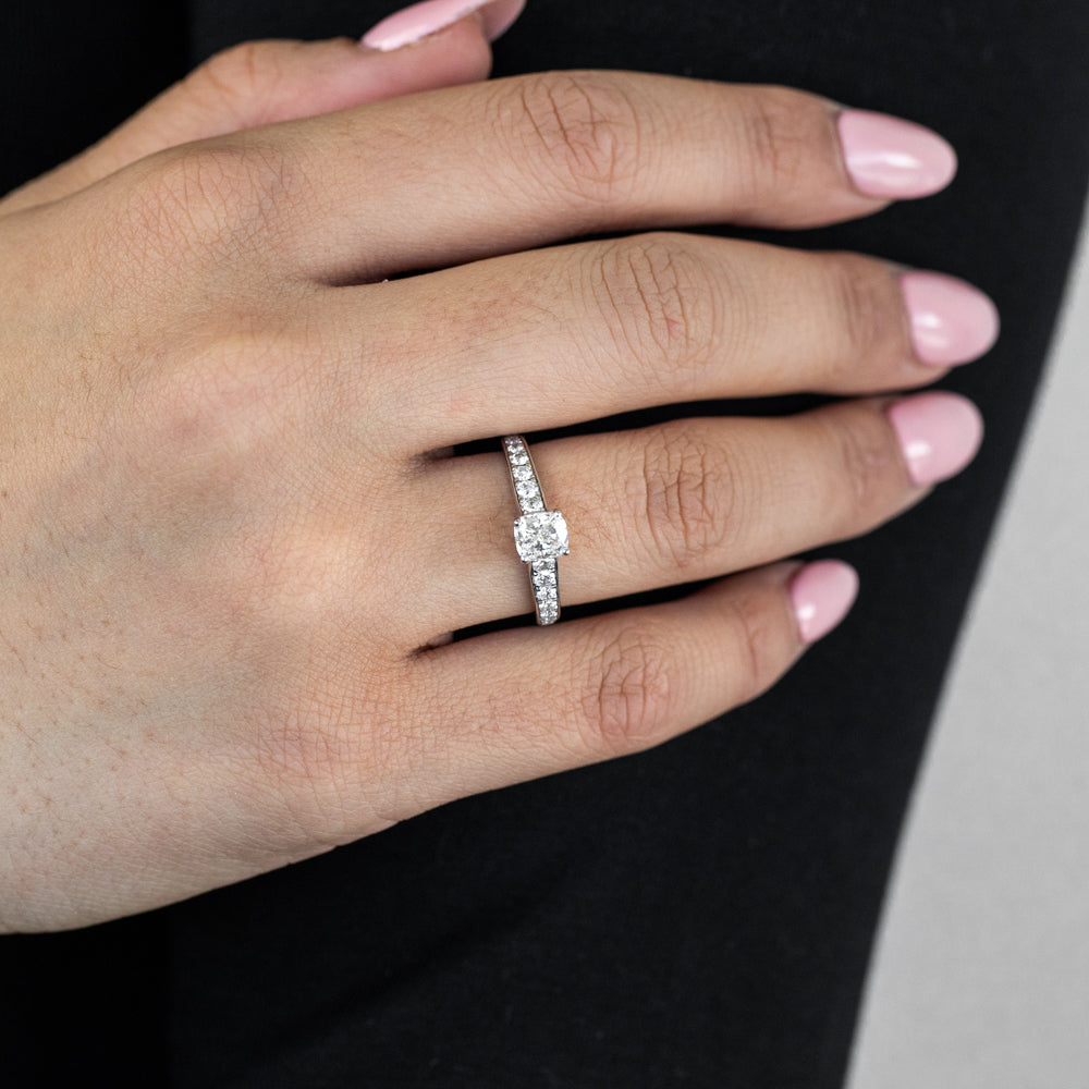 Exquisite 14 Carat White Gold Engagement Ring Featuring a 1.40 Carat Cushion Cut Centre Diamond