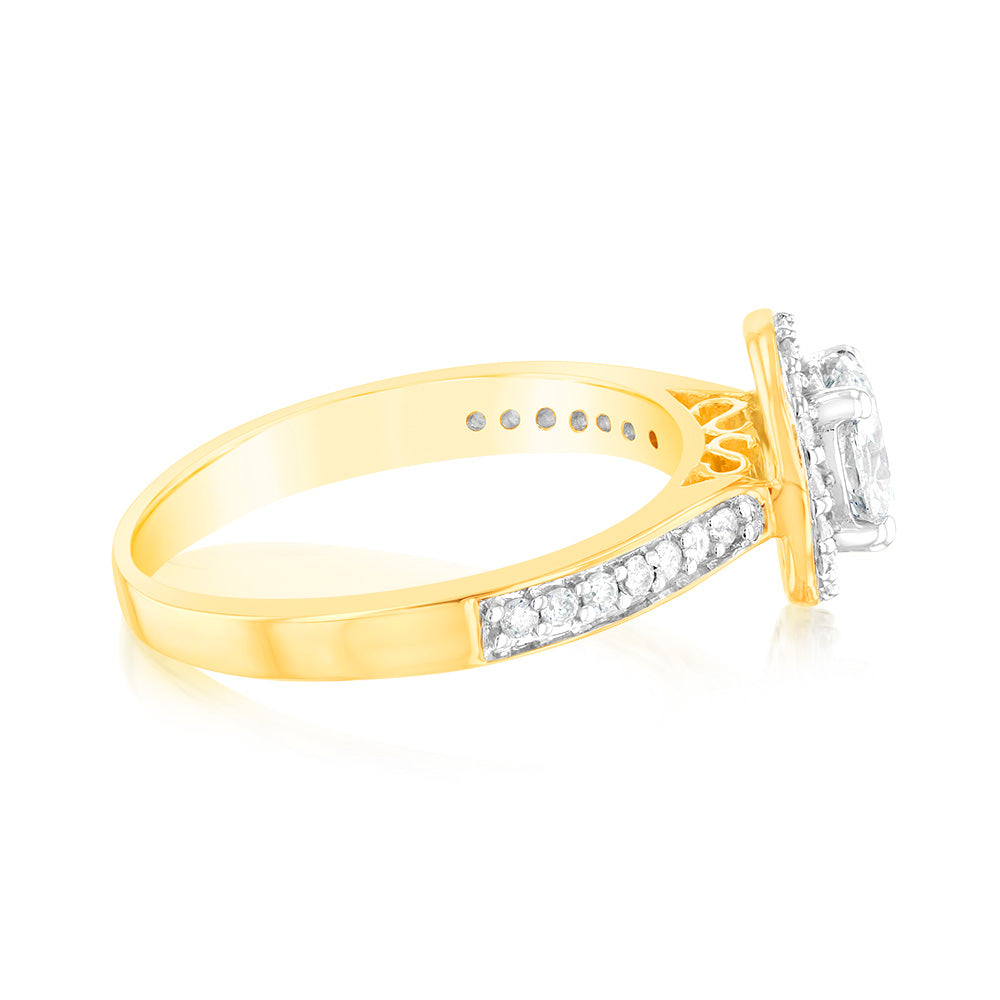 Exquisite 14 Carat Yellow Gold One-Carat Brilliant Cut Diamond Halo Solitaire Engagement Ring with Additional Diamonds on the Shank