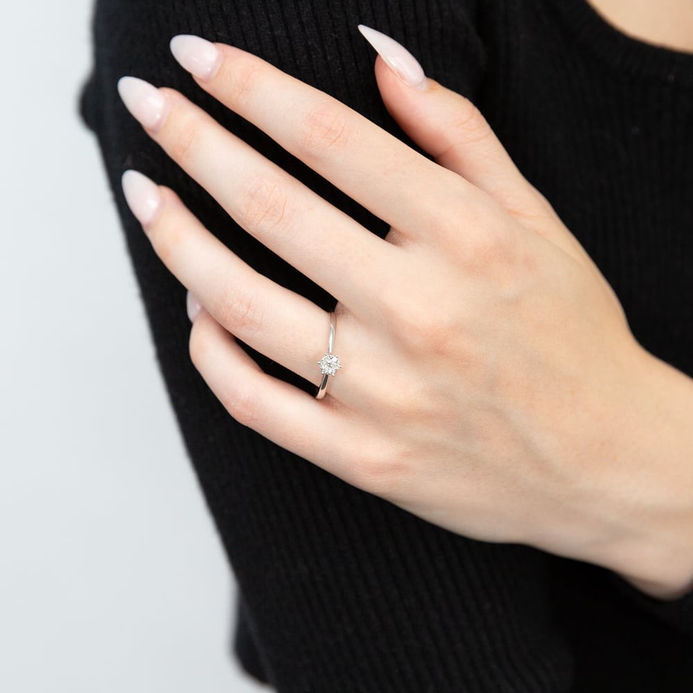 Stunning 9ct White Gold Cluster Engagement Ring Adorned with 7 Brilliant Diamonds