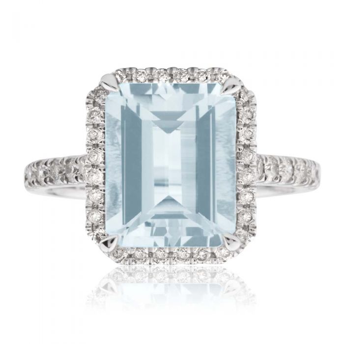 Stunning 9 Carat White Gold Ring Featuring 2.4 Carat Aquamarine and One - Third Carat Diamond