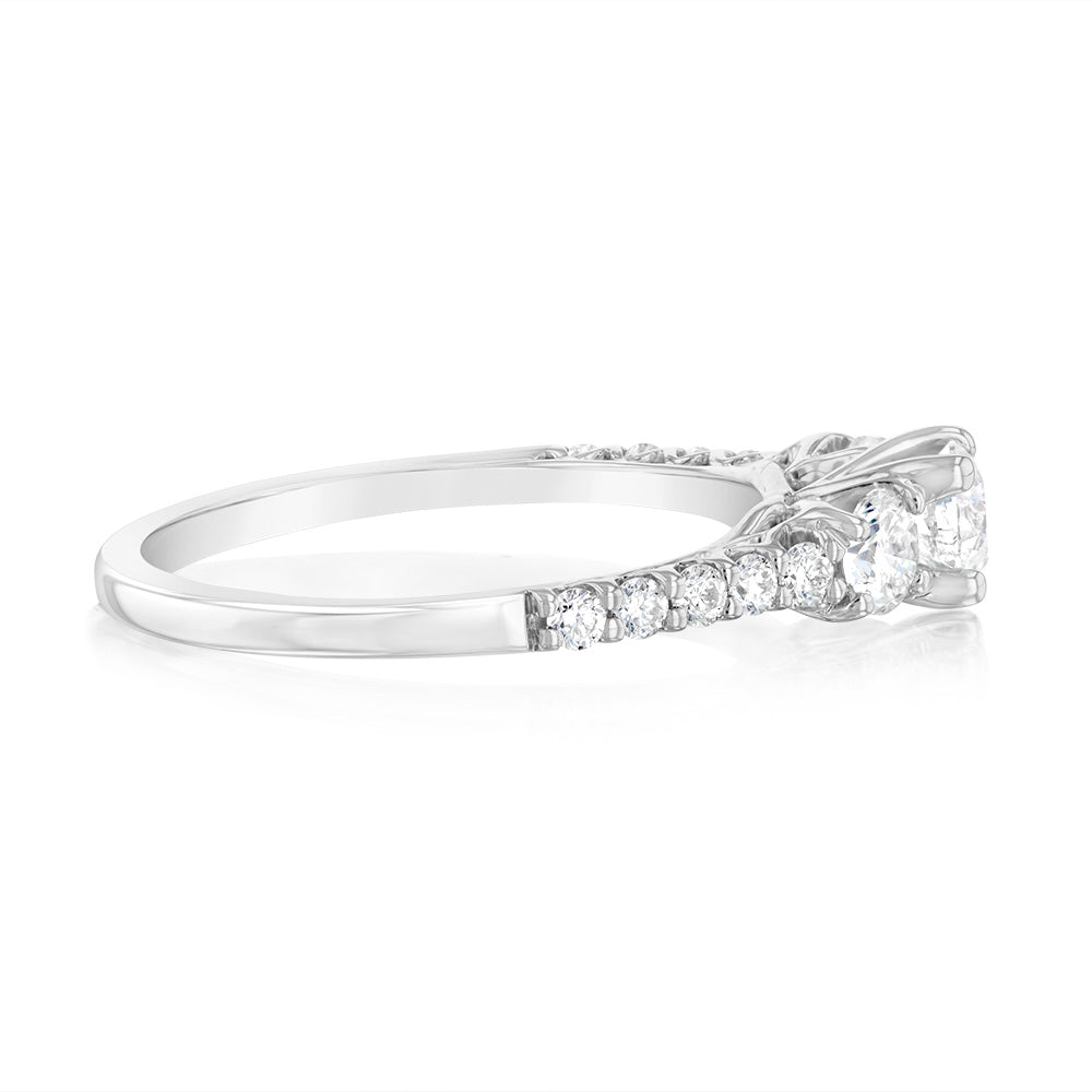 Exquisite 14 Carat White Gold Diamond Trilogy Ring with 1 Carat Brilliant Cut Diamonds and Additional Diamonds on the Shank, A Timeless Jewelry Piece