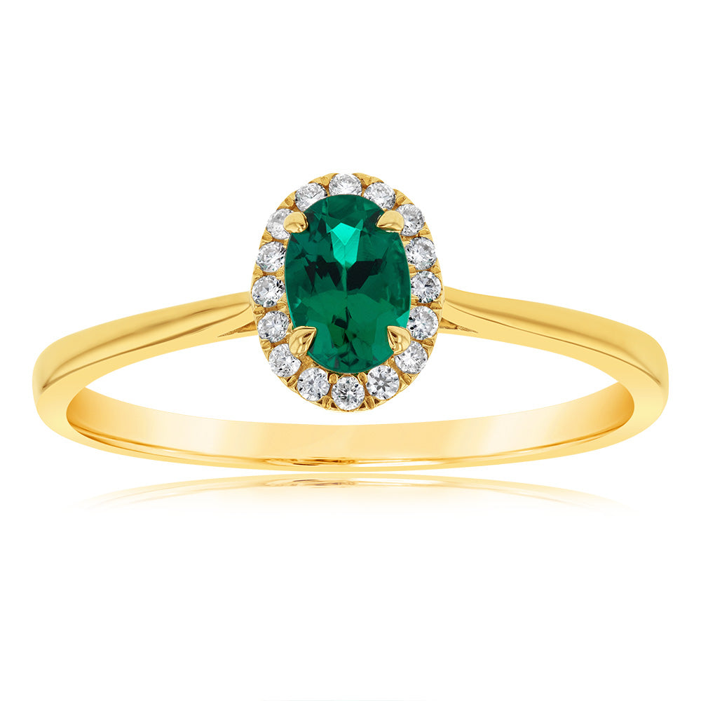 Exquisite 9ct Yellow Gold Ring with a Halo of Diamonds and a Created Oval Emerald