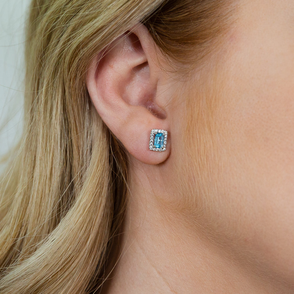 Exquisite 9ct White Gold Blue Topaz and Zirconia Emerald Cut Stud Earrings