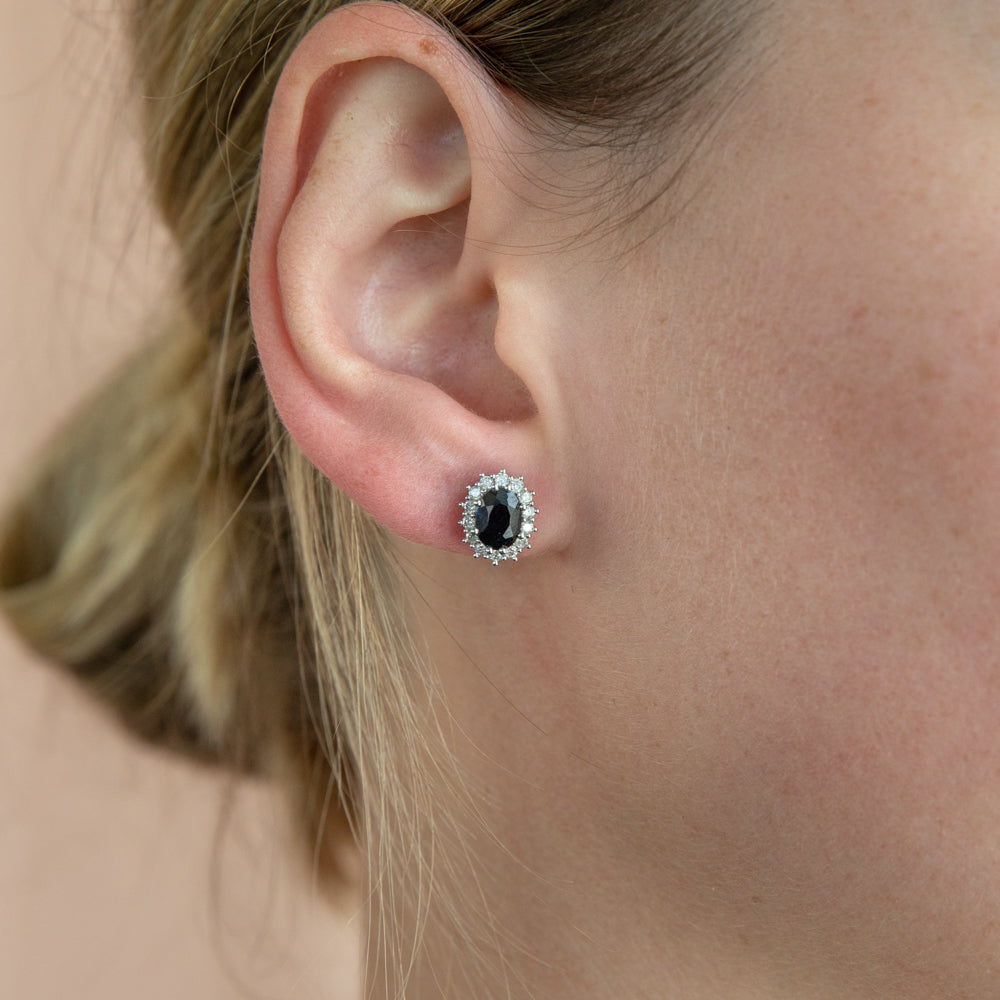 9ct Yellow Gold Stud Earrings with 7x5mm Oval Natural Sapphires and 0.42 Carat Diamonds