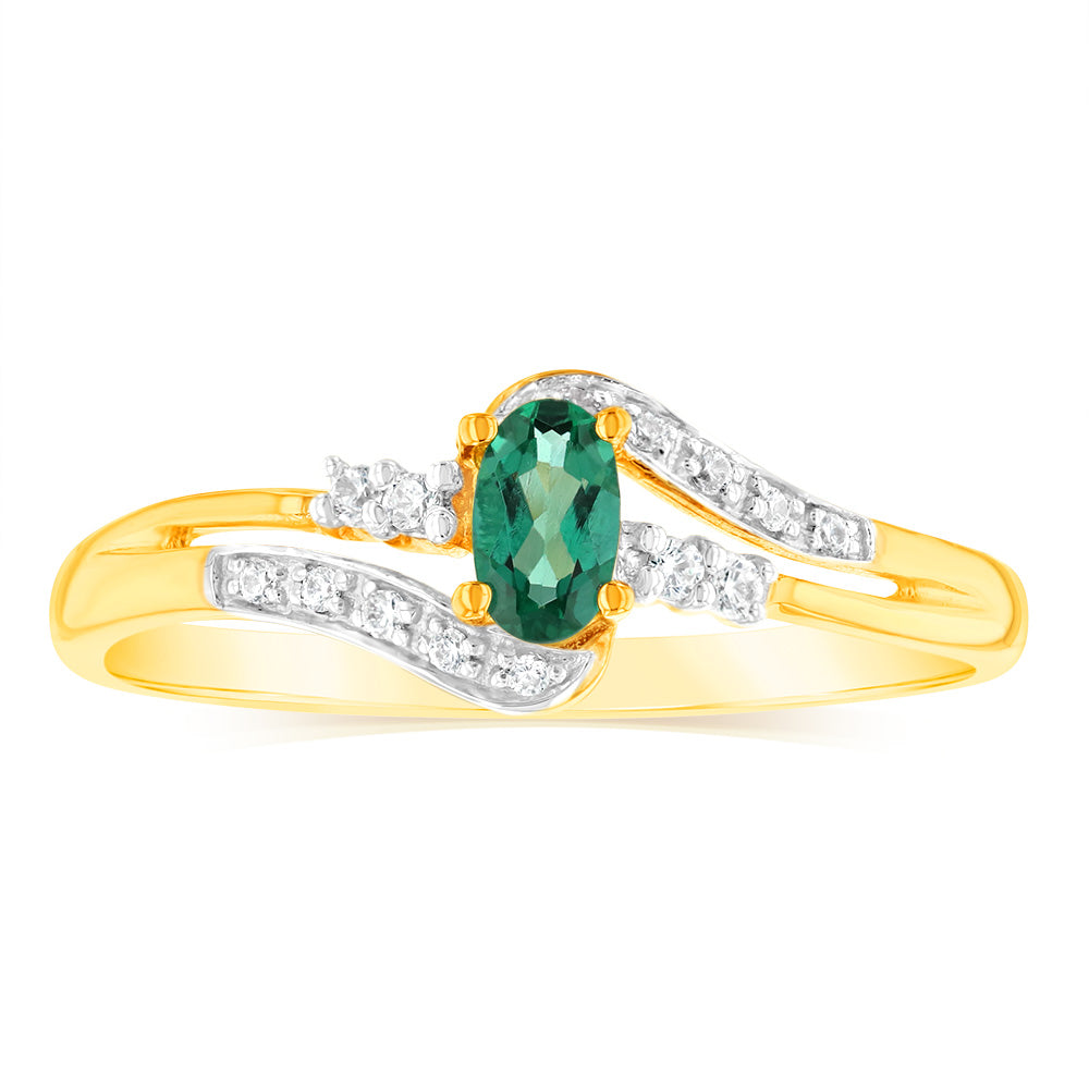 Exquisite 9 Carat Yellow Gold Ring Adorned with 0.26 Carat Created Emerald and 14 Cubic Zirconia Stones