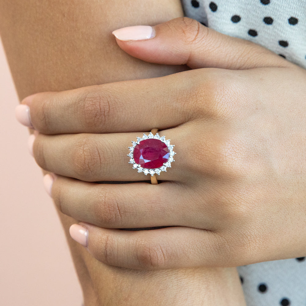 Stunning 9 Carat Yellow Gold Ring with 8 Carat Natural Enhanced Ruby and Half a Carat Diamond